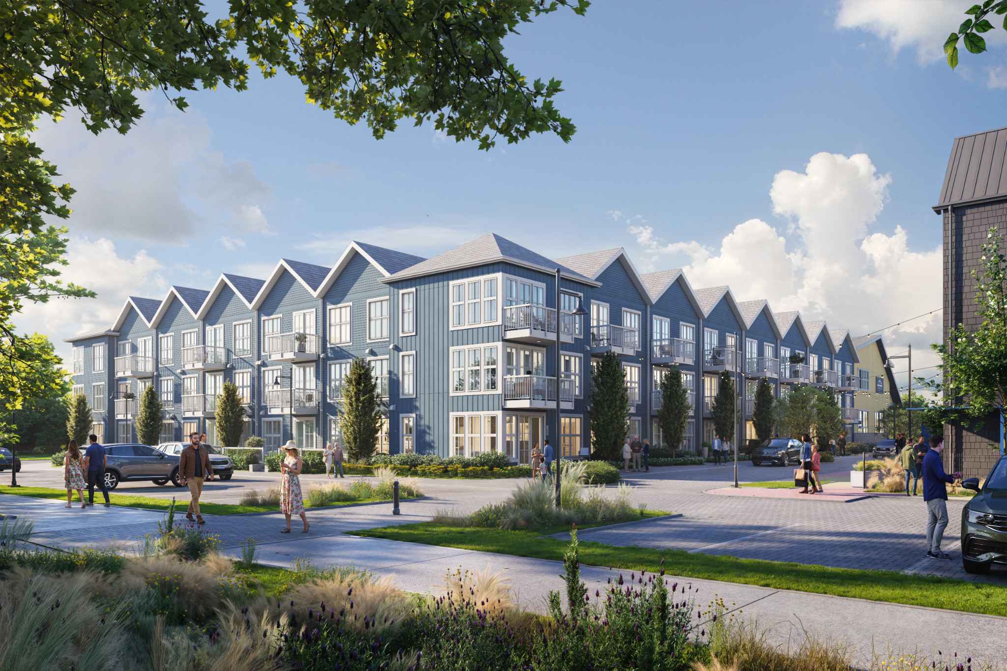 Market Commons – A bright, sunny ground-level rendering of a modern coastal-style residential building featuring blue vertical siding, repeating gabled rooflines, and private balconies. Pedestrians walk along paved pathways and landscaped greenery with ornamental grasses in front of the community under a clear blue sky with fluffy white clouds.