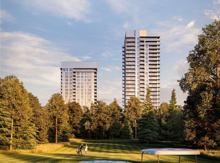 Wynwood Green – Two glass residential towers viewed from a grassy park with golfers and a bench in the foreground, mountains not visible, trees framing the towers.