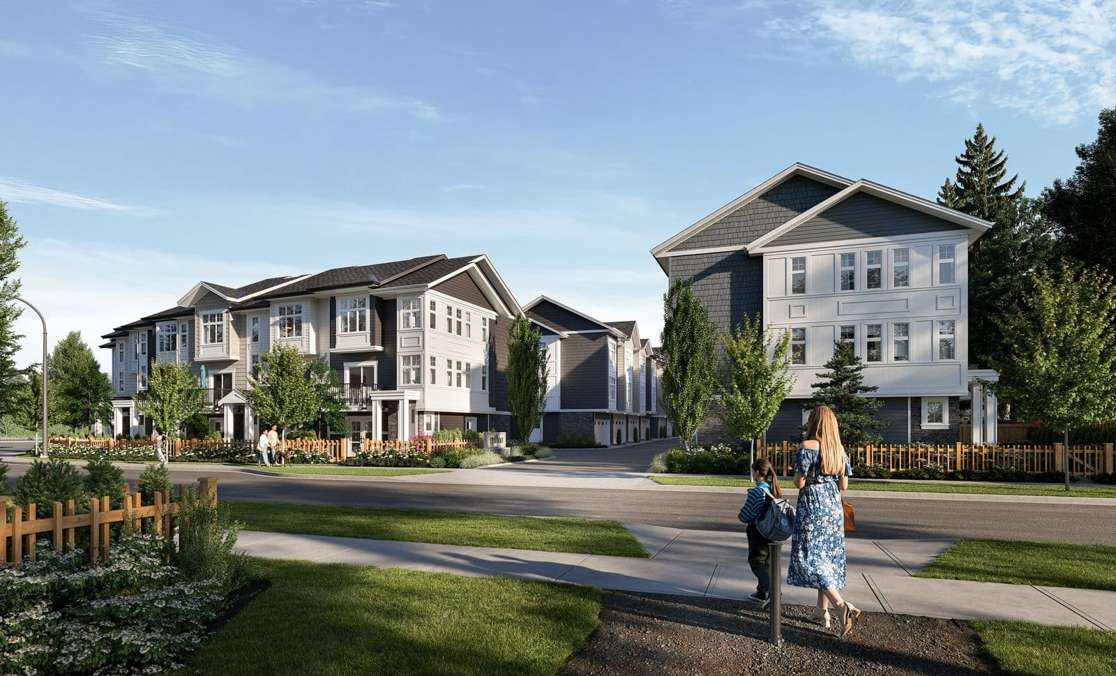 Griffon – Daytime street view of the townhome complex with a mother and children walking on the sidewalk in front of the buildings.