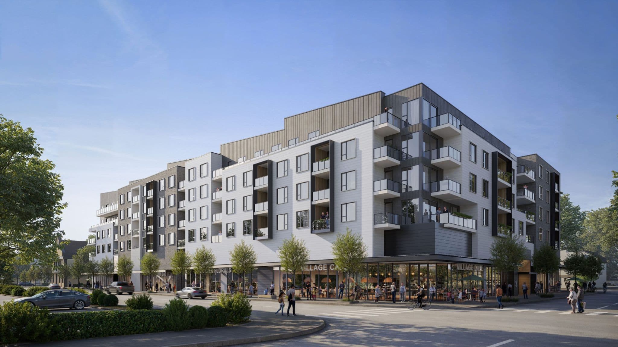 Bridge & Elliott – A modern five-story mid-rise residential building featuring white horizontal siding, dark grey accents, and private glass-railing balconies. The ground level features expansive storefront glass housing lively retail and a cafe, flanked by landscaped sidewalks with pedestrians, young trees, and cars along the street under a clear daytime sky.