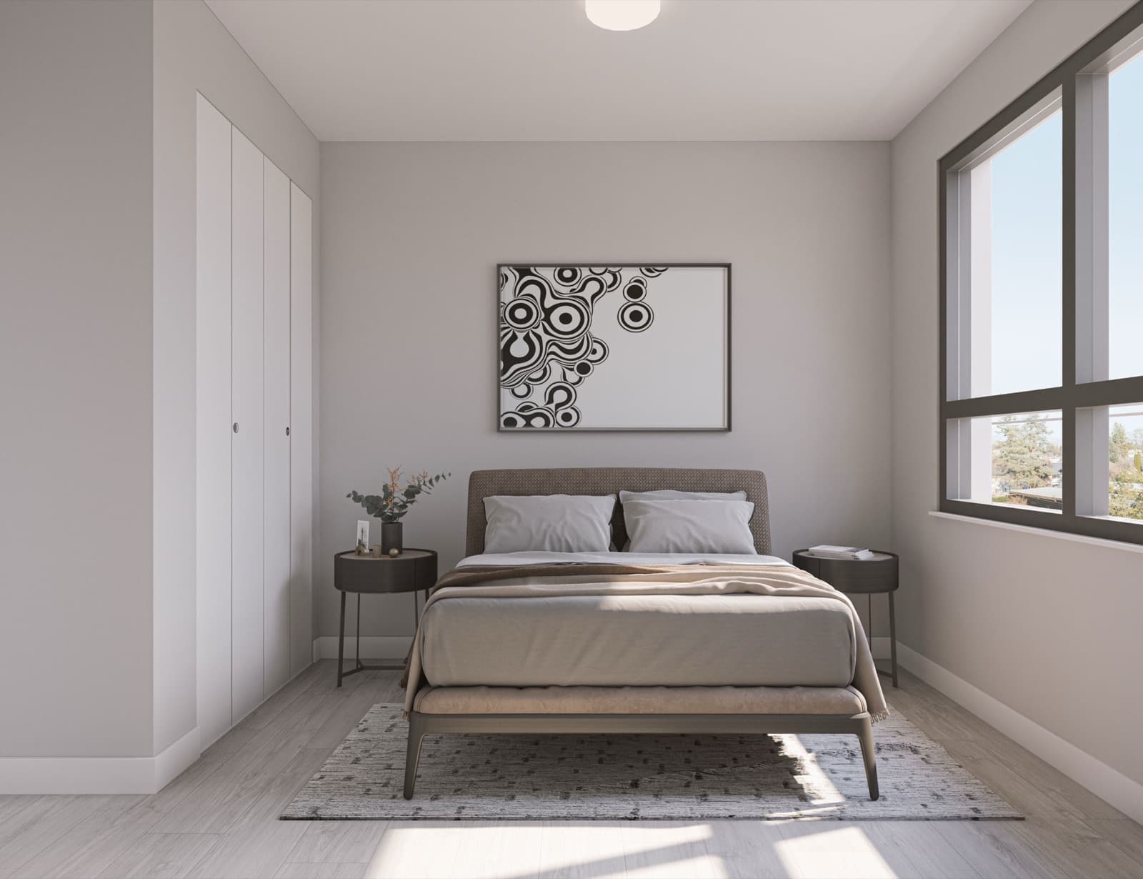 Véra – A bedroom with a upholstered grey headboard bed, dark round nightstands, an abstract black-and-white artwork, and a large window.