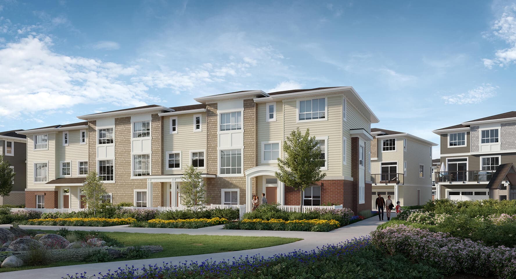 Aston – Rendering of a three-story townhome/apartment building with beige siding and brick accents, people walking on the front path amid landscaped gardens.
