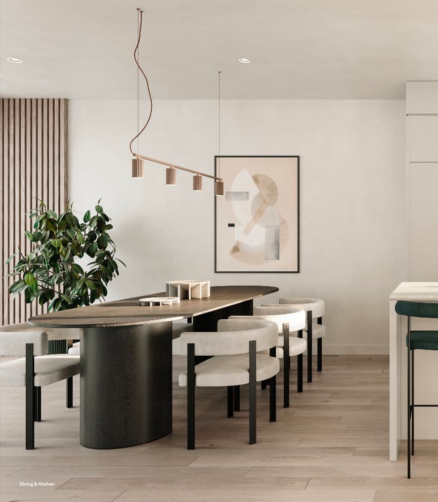 Rowen W47th – Dining and kitchen area with a long dark oval wood table, cream upholstered chairs, and a sculptural pendant light.