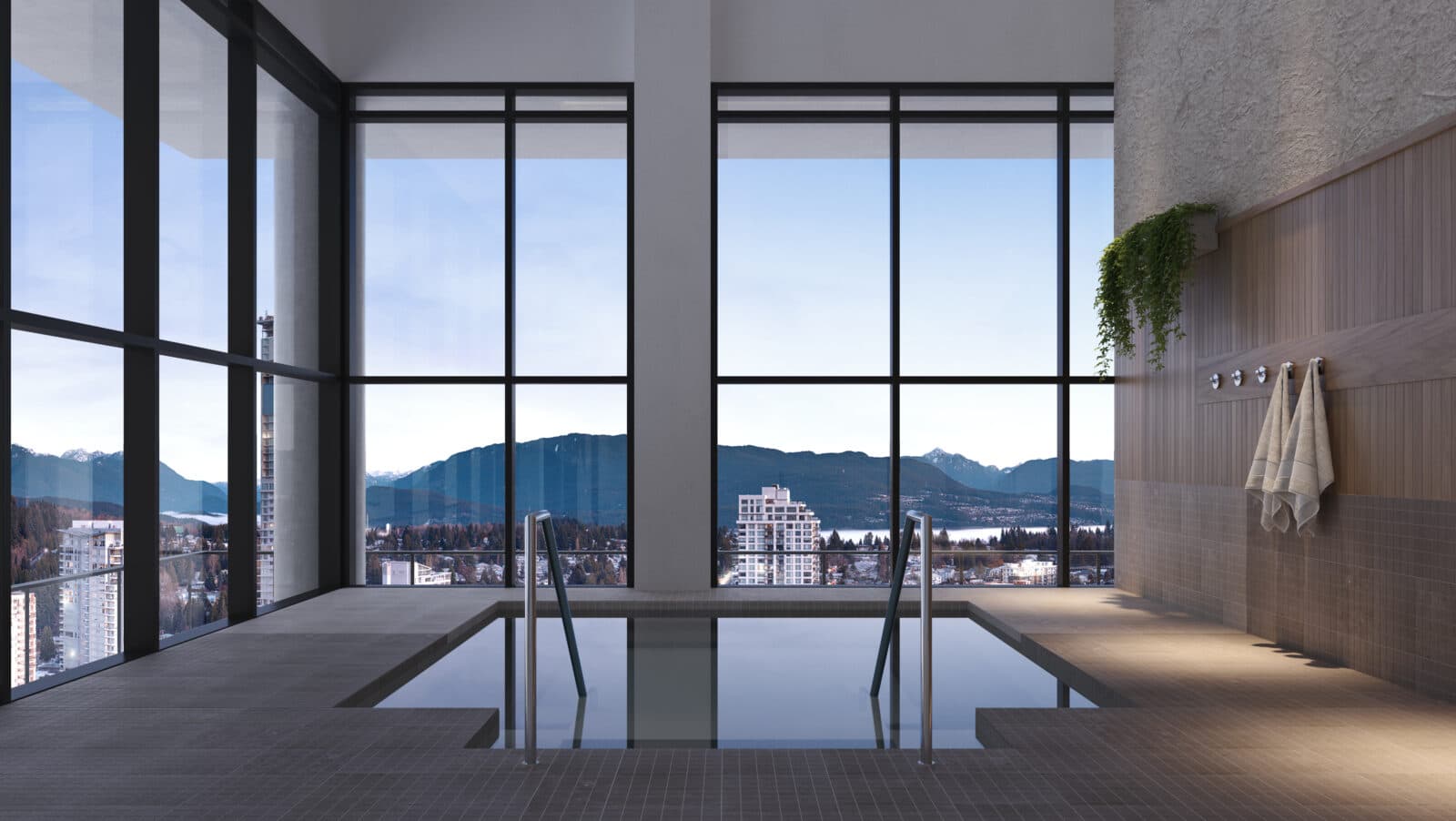 Jinju – An indoor spa pool or hot tub is framed by expansive floor-to-ceiling windows offering panoramic views of snow-dusted mountains, water, and city high-rises. The space features grey tiled flooring, wood-paneled walls with hanging towels, and a minimalist, tranquil atmosphere bathed in natural daylight.