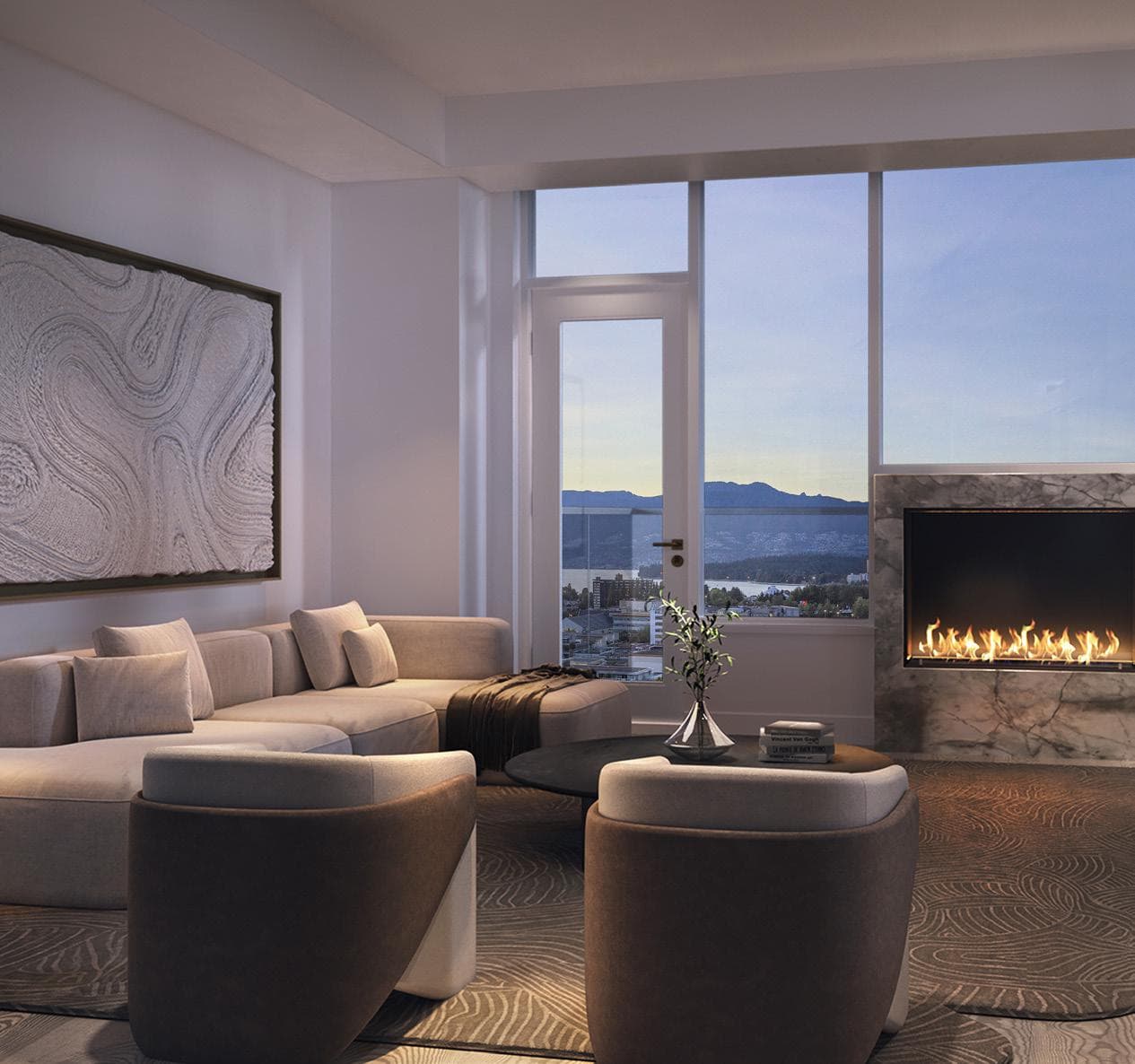 Italia – A living room with a large beige sectional sofa, two swivel accent chairs, a lit gas fireplace with marble surround, and floor-to-ceiling windows overlooking water and mountains at dusk.