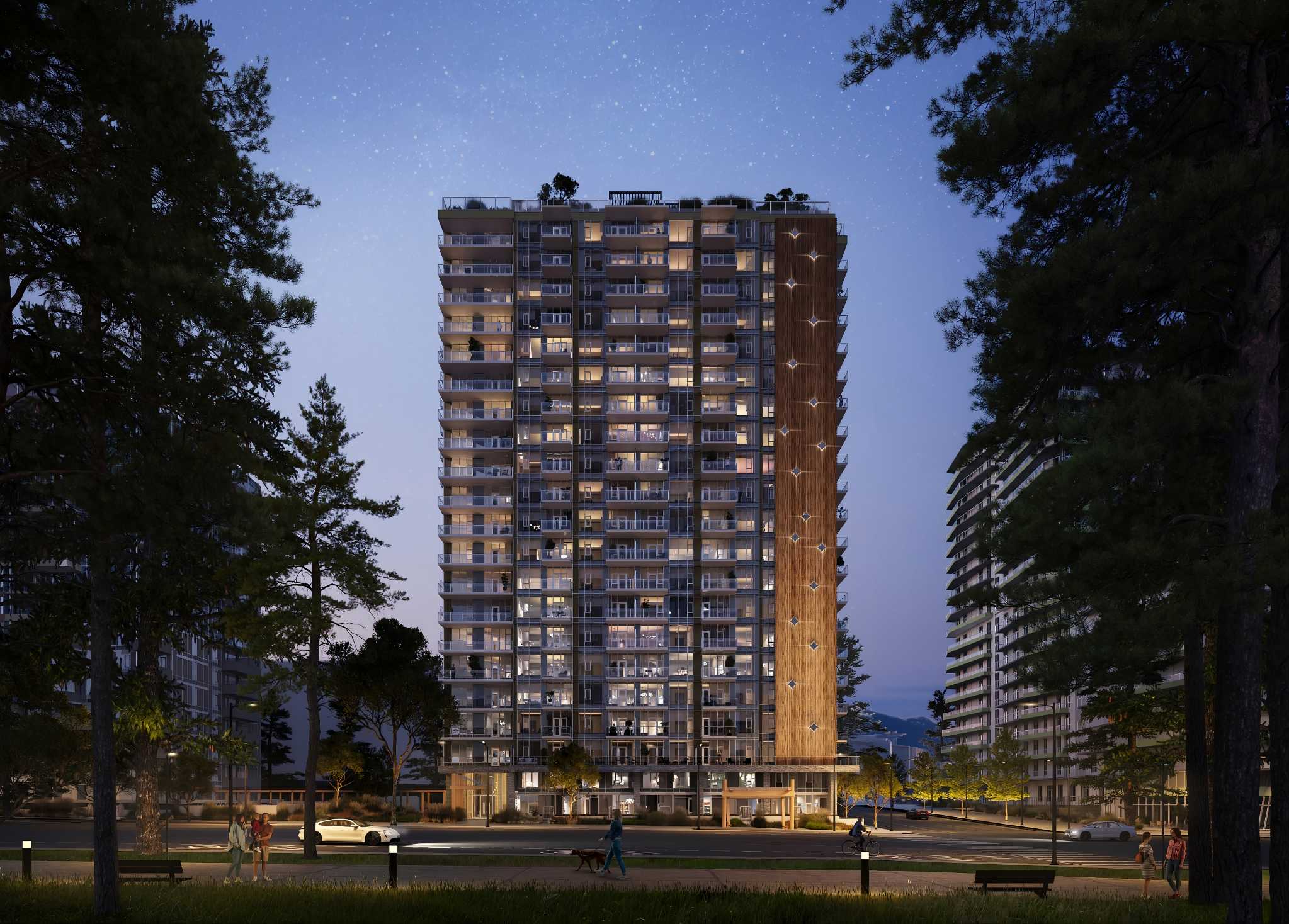 Kwasen Village – Dusk rendering of a tall residential tower with wood-accented balcony bands and a wood feature strip, surrounded by mature pine trees with a walking path and other towers in the background.