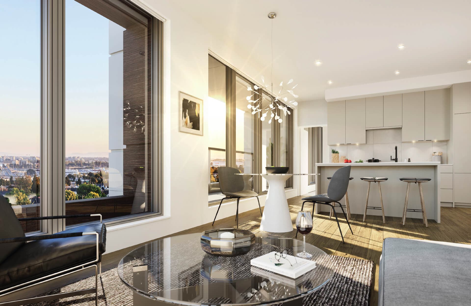 Ōku – Open-concept living room and dining area flowing into a kitchen with an island and bar stools, floor-to-ceiling windows showing a city view.