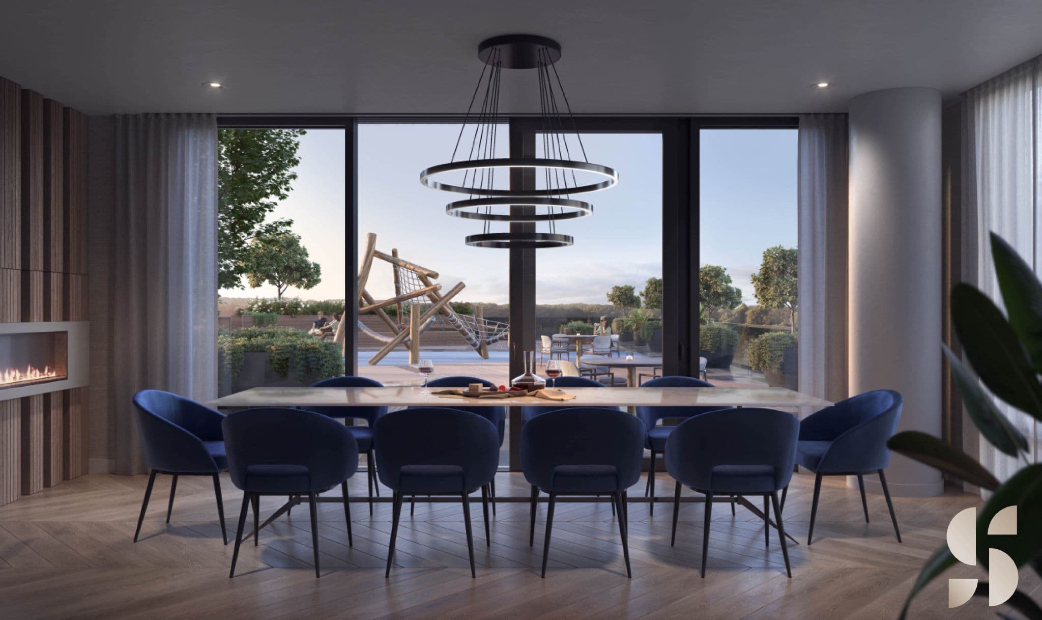 Sequoia – A sophisticated indoor dining lounge features a long table with royal blue chairs, a contemporary tiered chandelier, and a built-in fireplace over herringbone wood floors. Large floor-to-ceiling glass doors open to an outdoor terrace with seating, greenery, and a wooden playground structure under daylight.