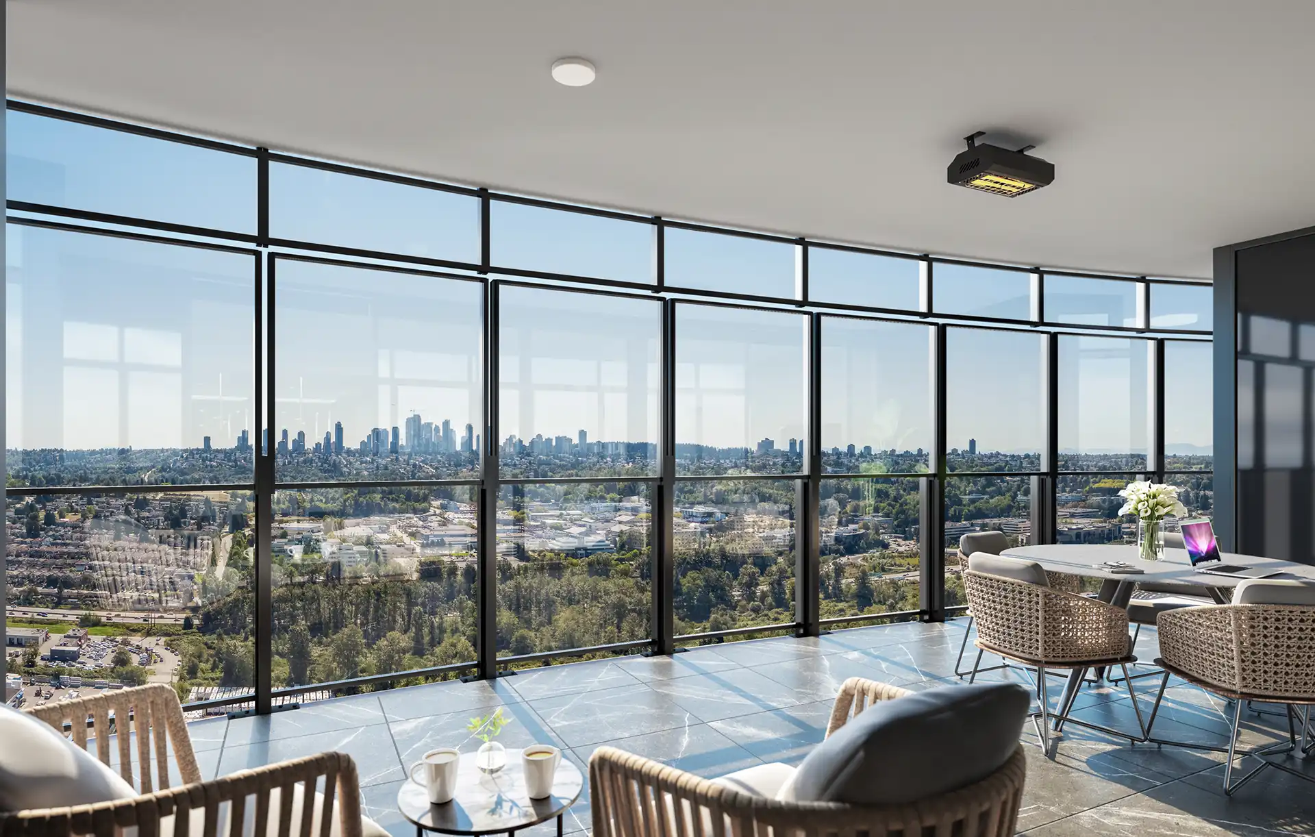 Oasis at Concord Brentwood – A high-rise covered terrace features a panoramic, wall-to-wall glass enclosure overlooking an expansive urban and forested landscape with a city skyline under a clear blue sky. The balcony is furnished with modern woven seating, a dining table, and dark tiled flooring, illuminated by bright daytime sunlight.