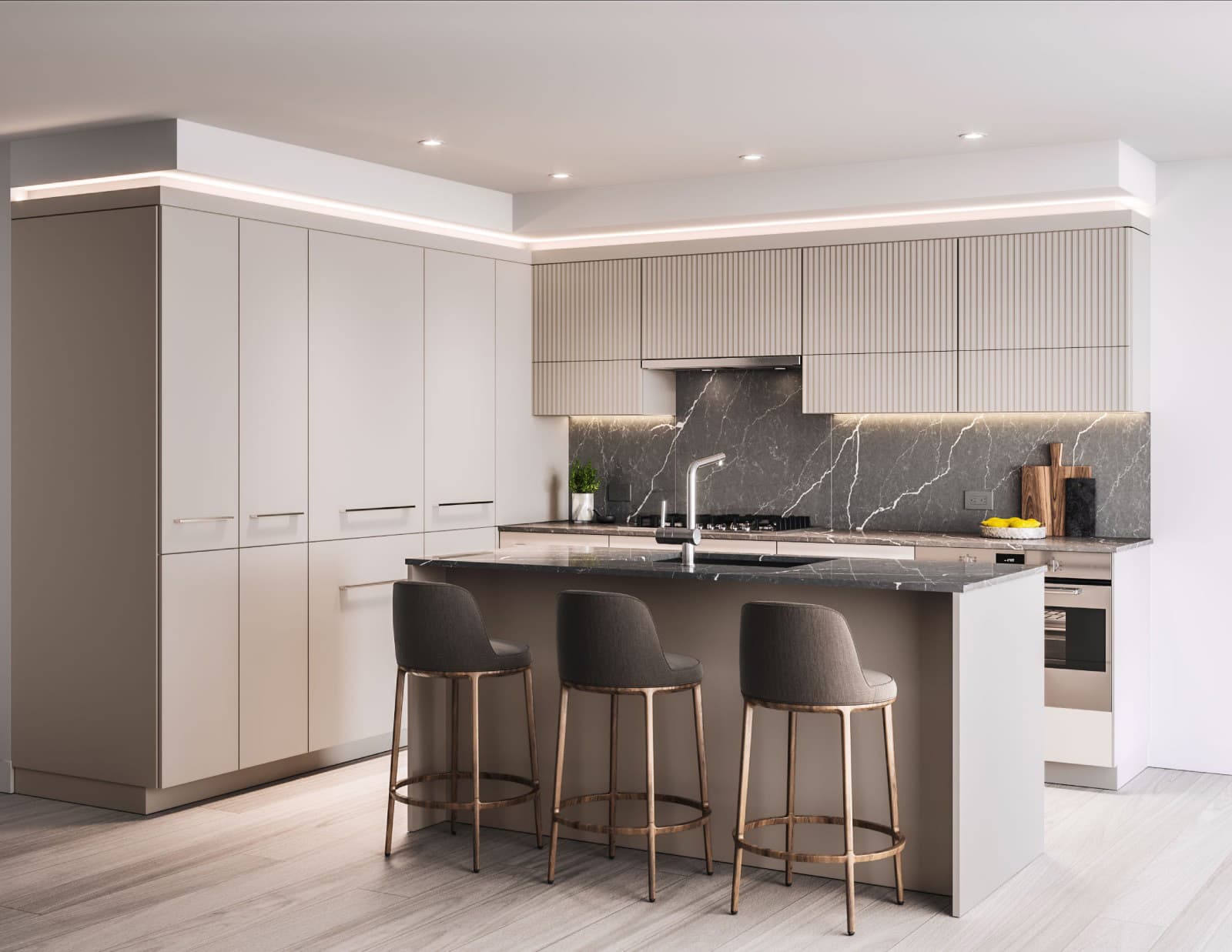 Oasis at Concord Brentwood – A modern residential kitchen featuring light beige cabinetry, vertical fluted upper cabinets, dark grey marble backsplashes, and integrated ambient lighting. A central kitchen island with matching dark marble countertops is surrounded by three fabric barstools with brass legs over light hardwood flooring.