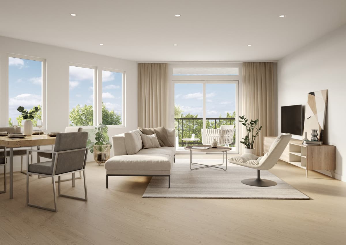 Montvue – Open-concept living and dining area with a beige sectional, dining table, TV console and a glass balcony door leading outside.