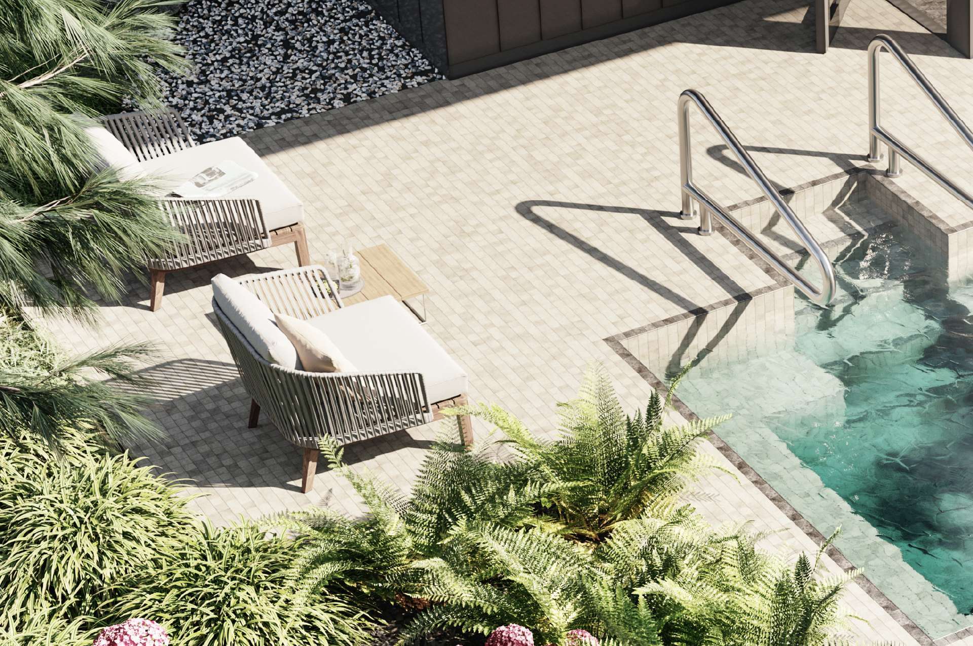 Rockford – Overhead view of a rooftop pool deck with lounge chairs, ferns, and a pool with metal handrail.