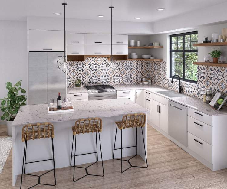 Havenridge – Kitchen with white cabinetry, patterned tile backsplash, open wood shelving, and an island with woven bar stools.