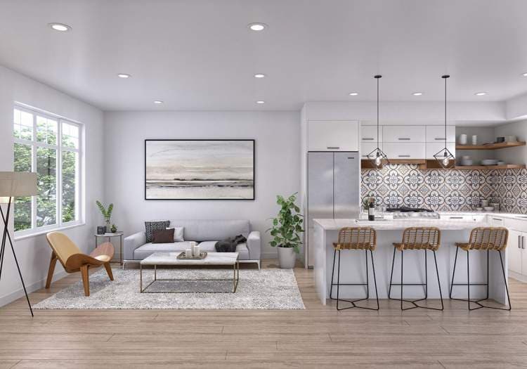 Havenridge – Open-concept living room and kitchen with patterned tile backsplash, an island with three woven bar stools, and a gray sofa.