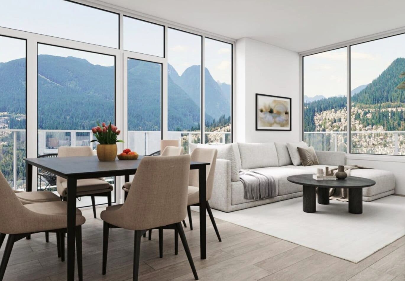 Pine & Glen – Rendering of a living and dining room with floor-to-ceiling windows showing a mountain and forest view, furnished with a dark dining table, chairs, and a light sectional sofa.