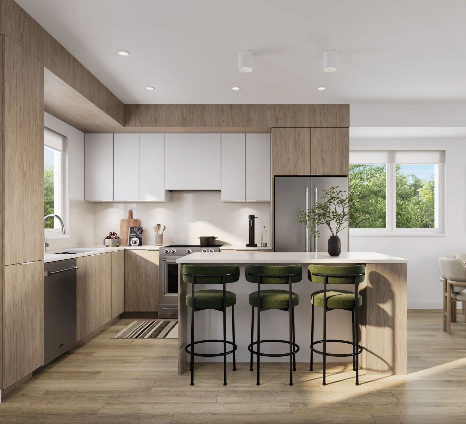 Nature Haus – Open kitchen with white upper cabinets, wood-tone lower cabinets, a stainless fridge, and a white island with green bar stools.