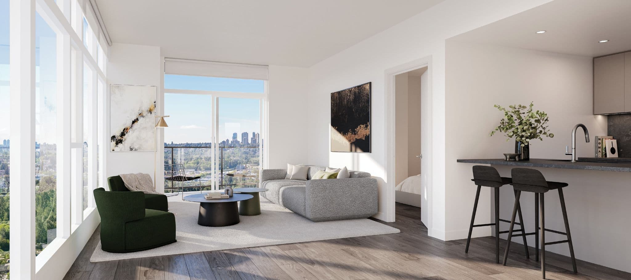 South Yards – Living room with a green armchair, grey sectional, and abstract art, opening onto a balcony with a distant city skyline, and a kitchen counter with bar stools to the right.