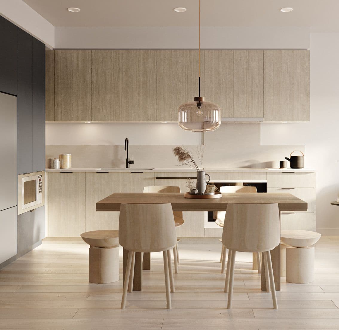Baden Park – Kitchen and dining area with light wood cabinetry, a pendant light over a wood dining table, and matching wooden chairs and stools.