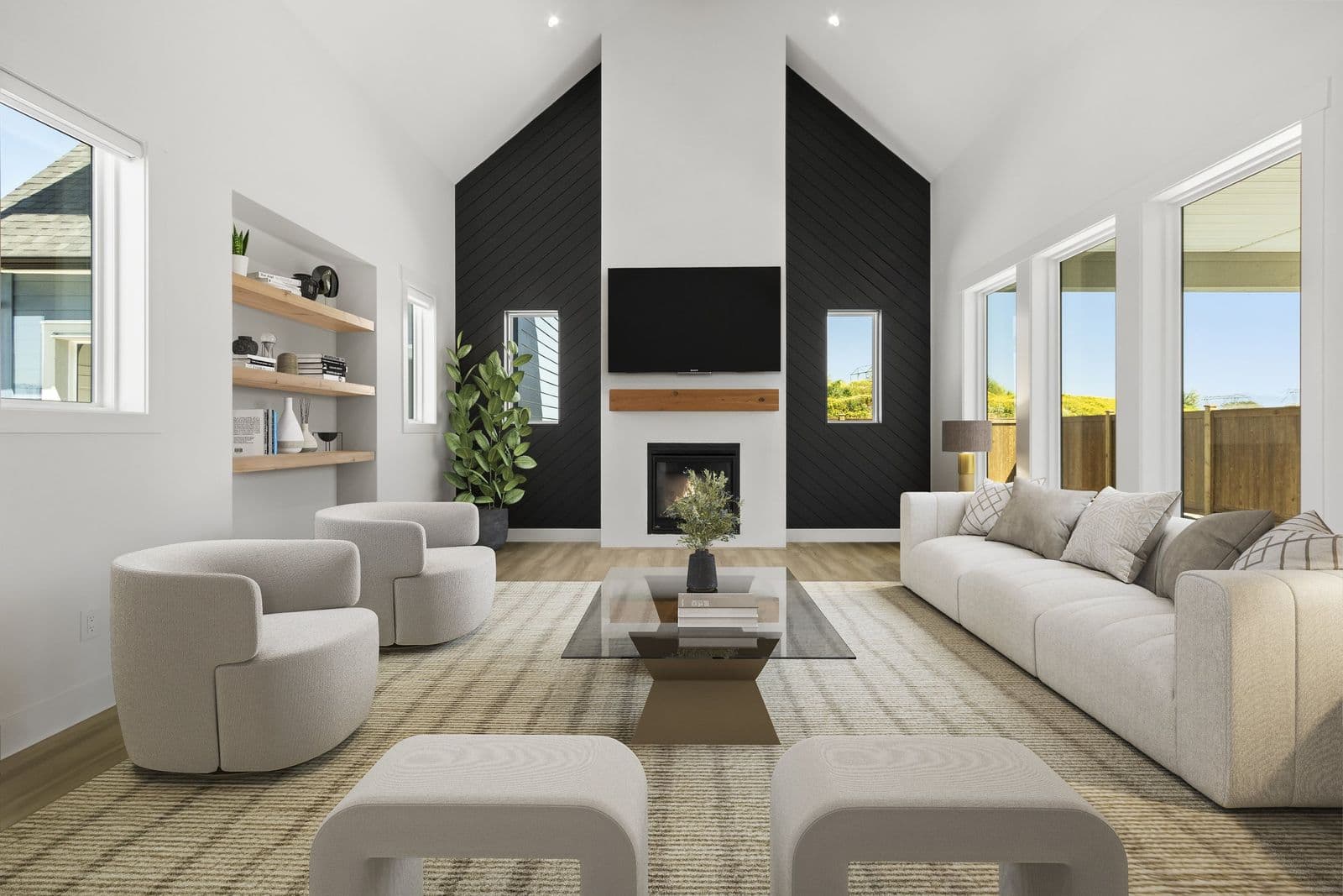 Iron Horse – Rendering of a vaulted living room with a black shiplap accent wall around the fireplace and TV, built-in shelving, a white sofa, and swivel chairs.
