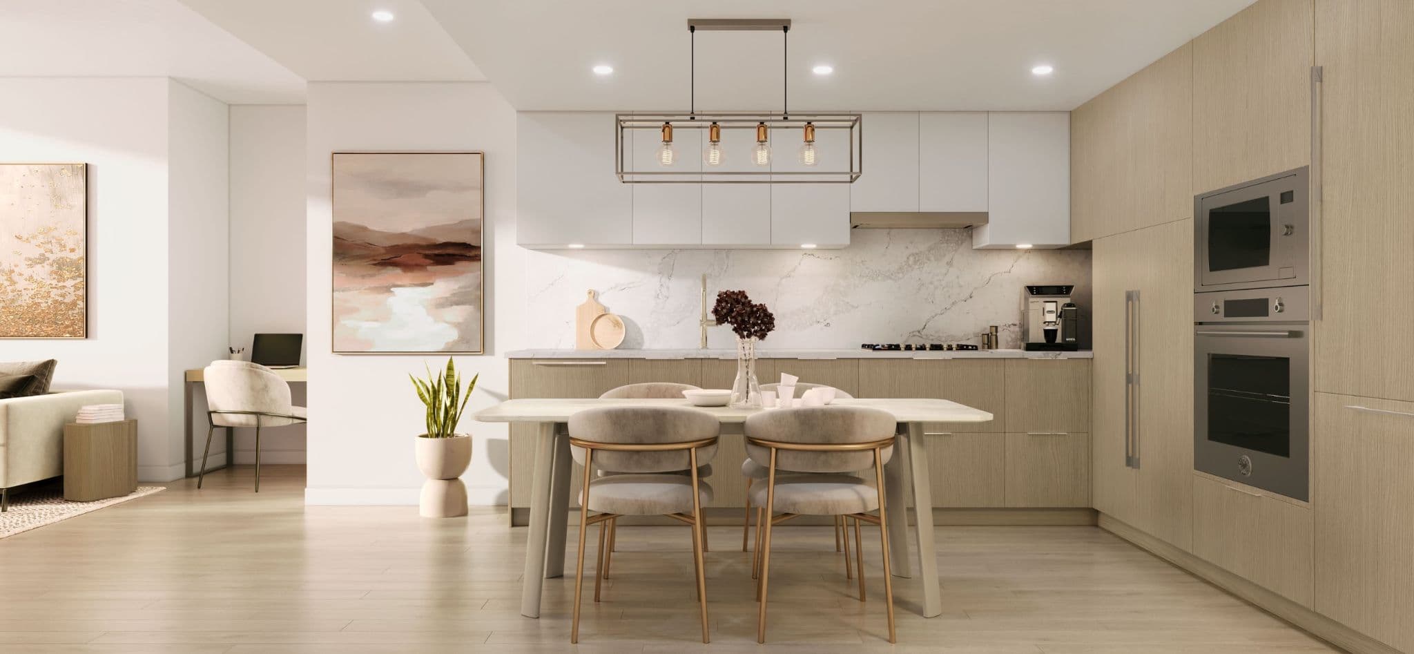 Talistar – A modern open-concept kitchen and dining area features light wood lower cabinets, white upper cabinets, marble backsplash, and a metal rectangular chandelier over a dining table with plush chairs. Warm interior lighting illuminates the space, which includes a small built-in home office nook visible in the background.
