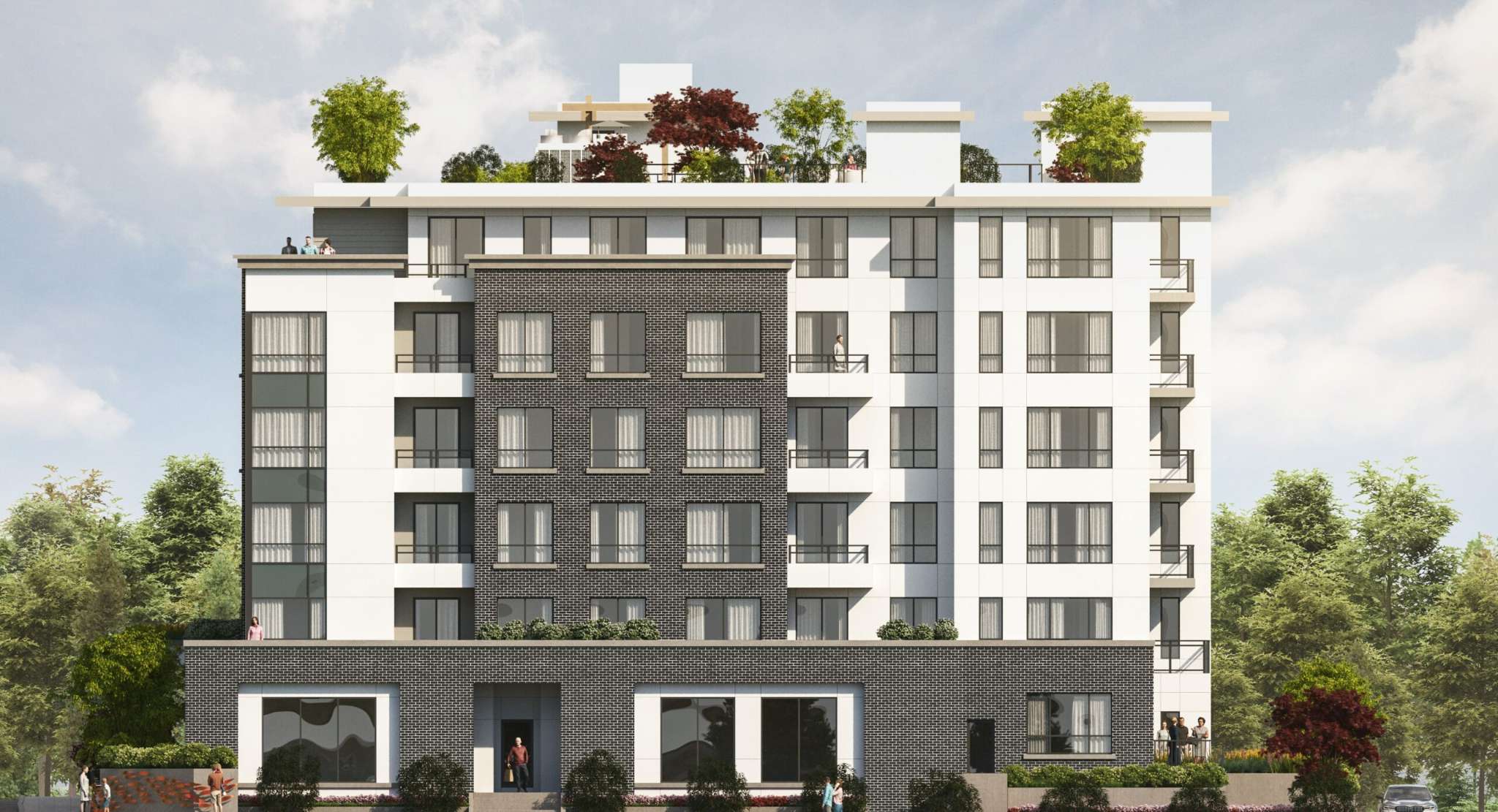 La Riviere – A front elevation view of a mid-rise apartment building with white and dark grey panels, balconies, and a landscaped rooftop terrace.