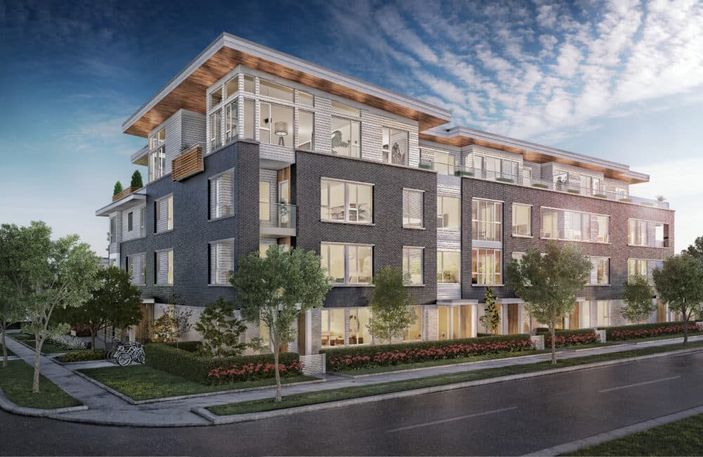 Slate & Ash – Daytime street view of the building's entrance with wood-accented balconies, flowering shrubs, and bike racks out front.