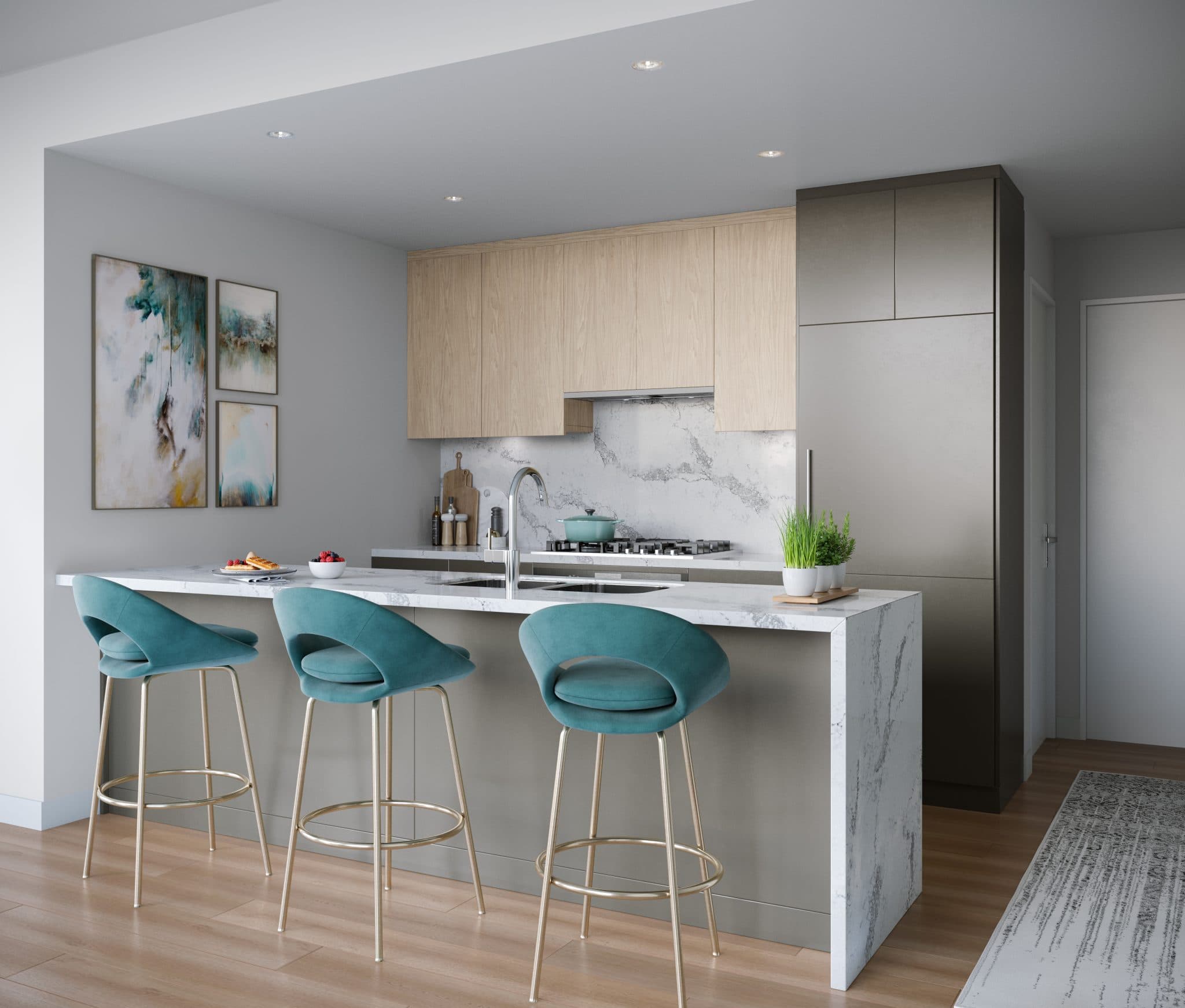 Vue – A modern kitchen featuring a marble waterfall island paired with three teal velvet barstools on brass frames. Light wood upper cabinets, a matching marble backsplash, and seamless gray integrated cabinetry create a sleek, contemporary atmosphere over warm wood flooring.
