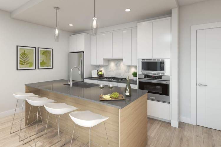 Highpointe – Rendering of a white kitchen with wood-front island, grey quartz countertop, pendant lighting, stainless steel built-in oven and microwave, and white barstools.