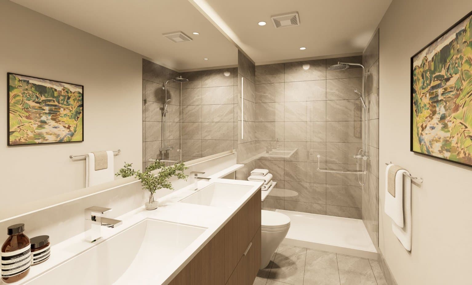 Goldfinch – Bathroom with a double vanity, large mirror, rain shower heads, grey tile walls, and a separate toilet area.