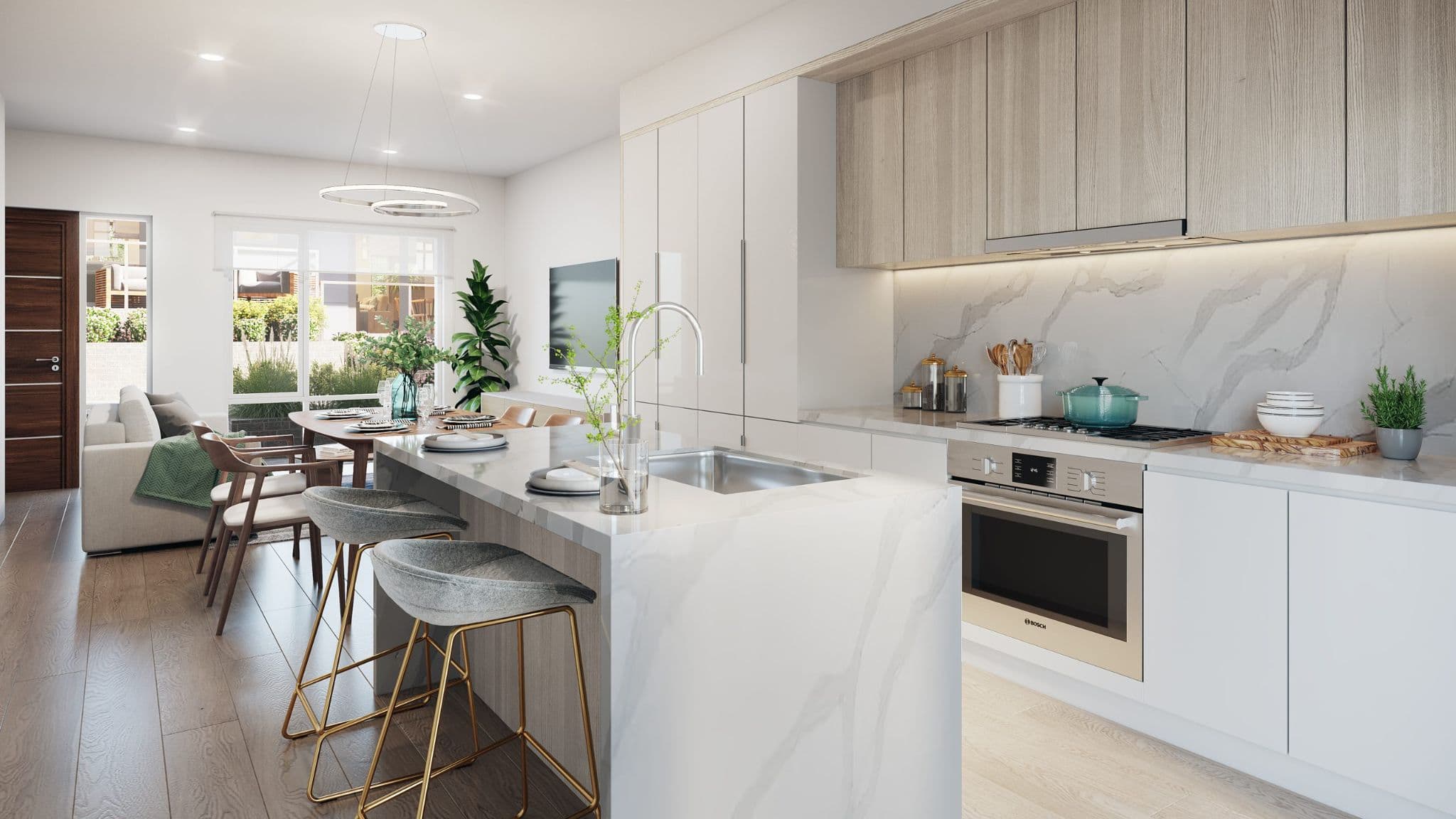West58 – A modern open-concept kitchen featuring a white marble waterfall island with barstools, integrated Bosch appliances, and light wood upper cabinetry. In the background, the dining area and living room lead out to large windows with views of a sunny outdoor patio.