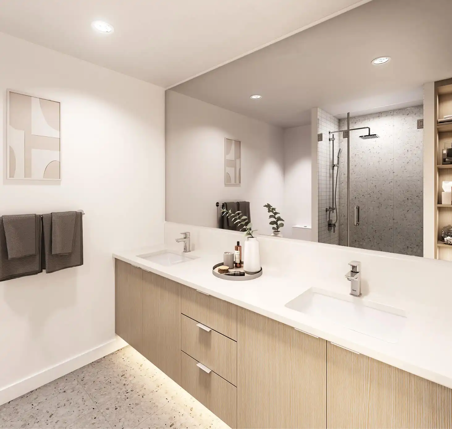 Rove – Bathroom with a double vanity, large mirror, wood cabinetry, and a glass-enclosed shower with rain shower head.