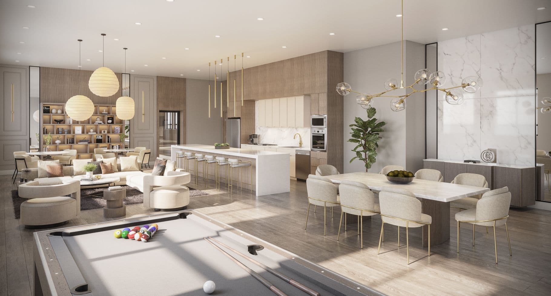 Amson Bloc – A sprawling, open-concept residents' lounge features a billiards table in the foreground, flanked by a formal dining table and a contemporary kitchen with a long waterfall island and barstools. In the background, plush cream-toned seating areas, wood-panelled accents, and modern globe pendant lights create an inviting, brightly lit communal space.