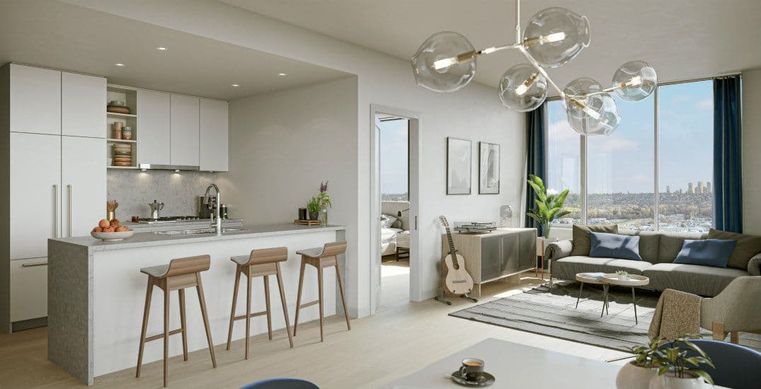 Alaska Condos – Open kitchen and living room with a white island, wood bar stools, and floor-to-ceiling windows showing a city skyline.