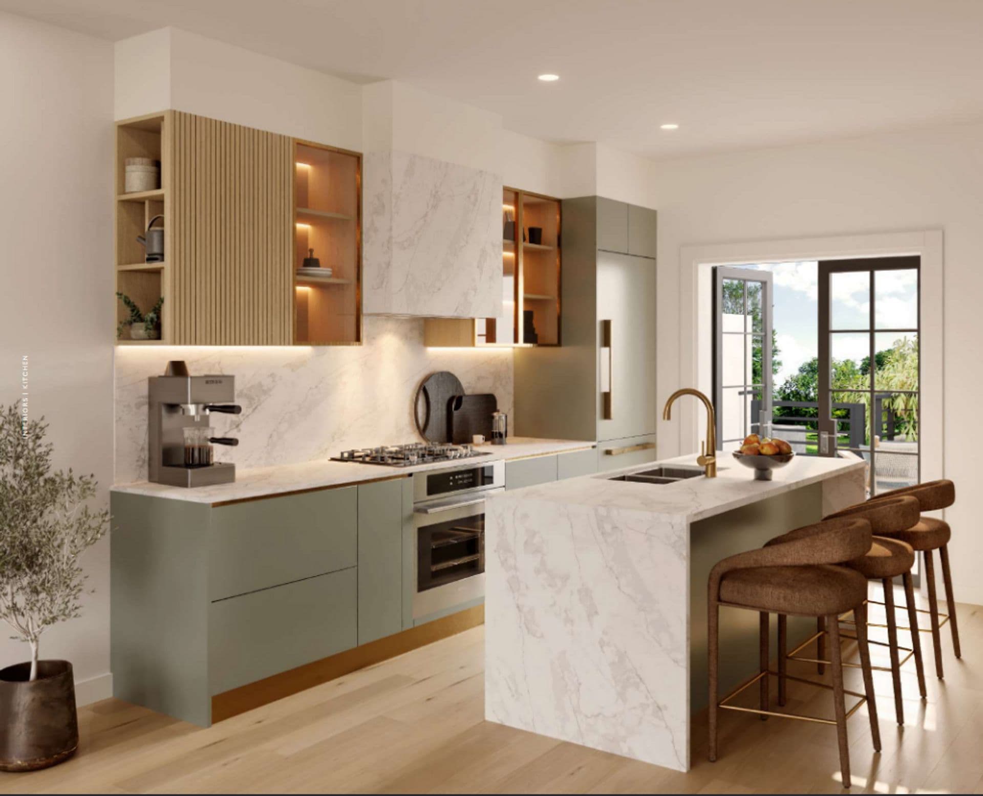 Ashlyn – A modern, bright kitchen featuring sage green lower cabinets, light wood-slatted upper cabinetry with integrated lighting, and a white marble waterfall island with barstool seating. Brass accents and open glass balcony doors in the background enhance the airy, luxurious ambiance.