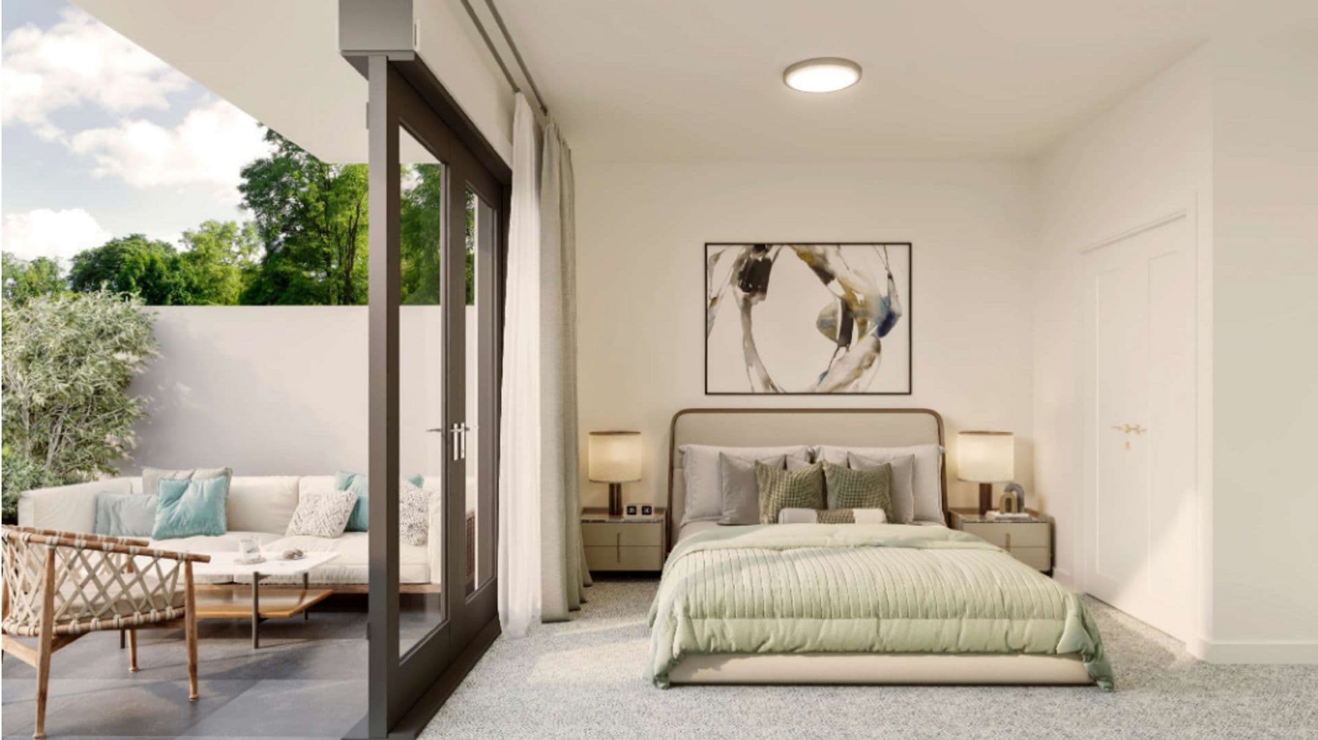 Ashlyn – A bright, contemporary bedroom features a dressed bed flanked by matching nightstands and lamps, with large glass sliding doors opening onto an outdoor patio. The private patio includes comfortable outdoor lounge seating set against lush greenery under a bright, daytime sky.