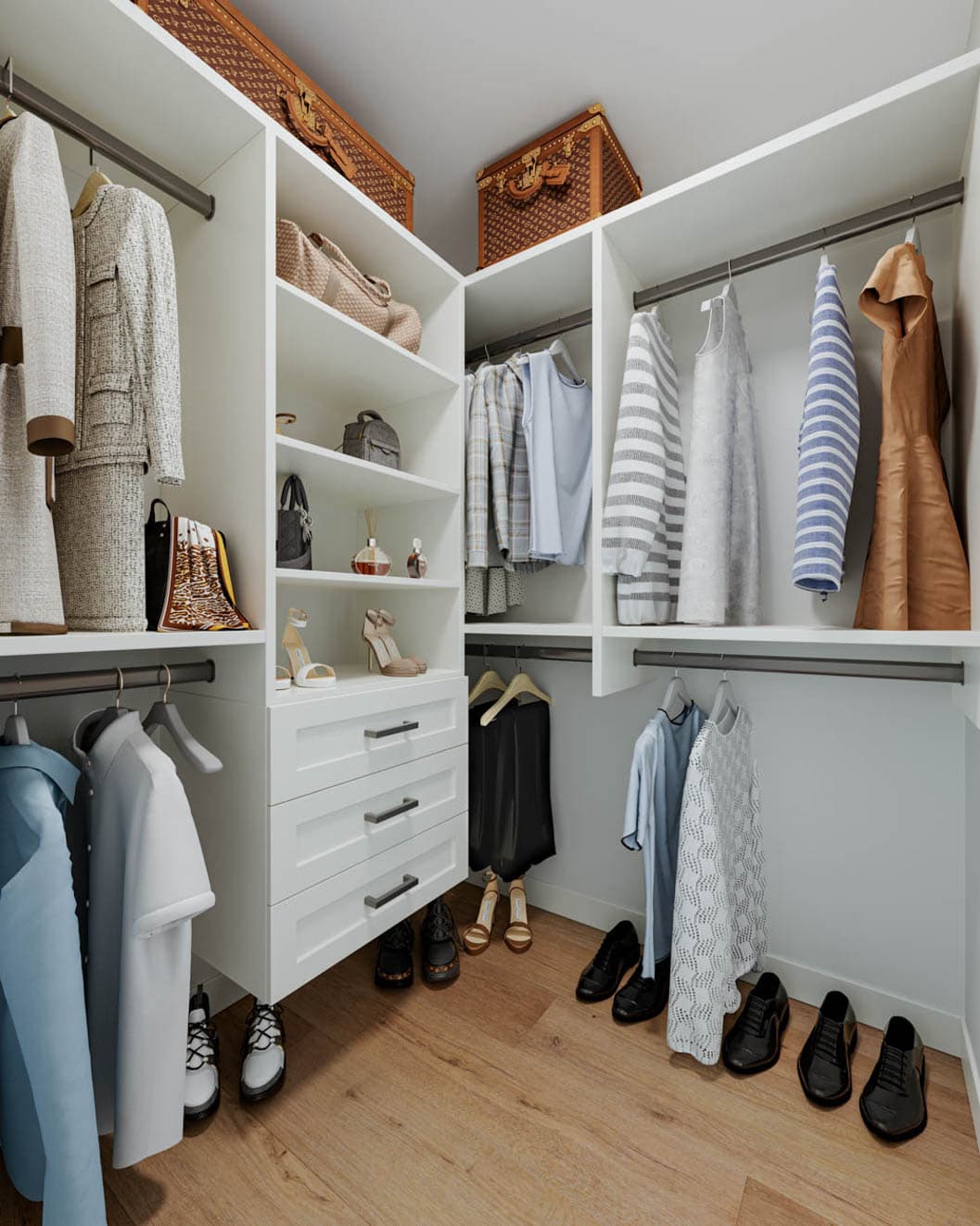 Kin & Kith – A custom walk-in closet with built-in shelving, drawers, hanging rods, and organized clothing.