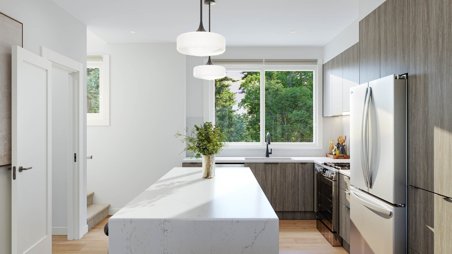Kin & Kith – Kitchen angle showing waterfall quartz island countertop, dark wood grain lower and upper cabinets, double door refrigerator, and window looking onto greenery.