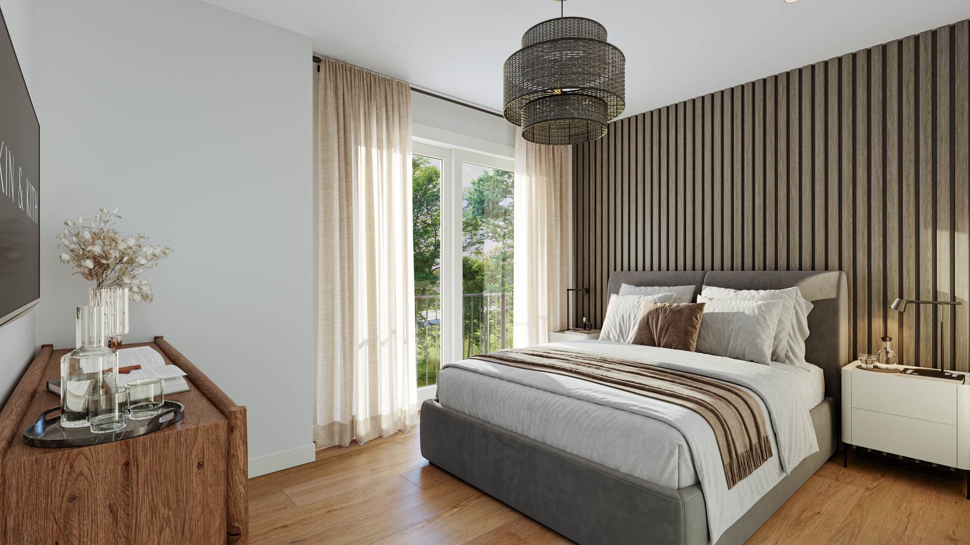 Kin & Kith – Bedroom view featuring dark wood paneling accent wall behind an upholstered bed, woven drum light, and sheer curtains framing the balcony door.