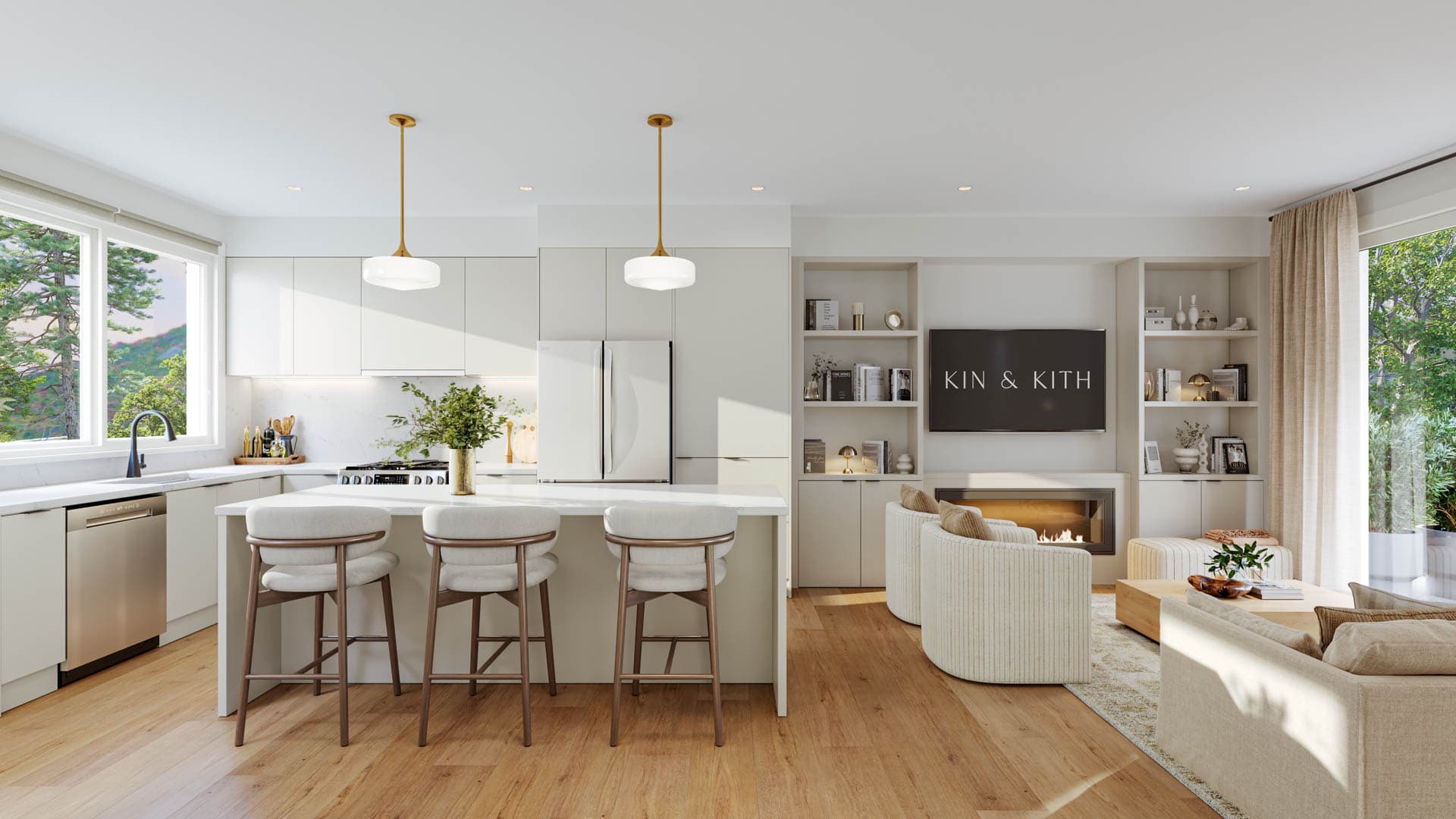 Kin & Kith – Open living room and kitchen setup featuring a kitchen island with three counter stools, hardwood floors, and built-in wall unit.