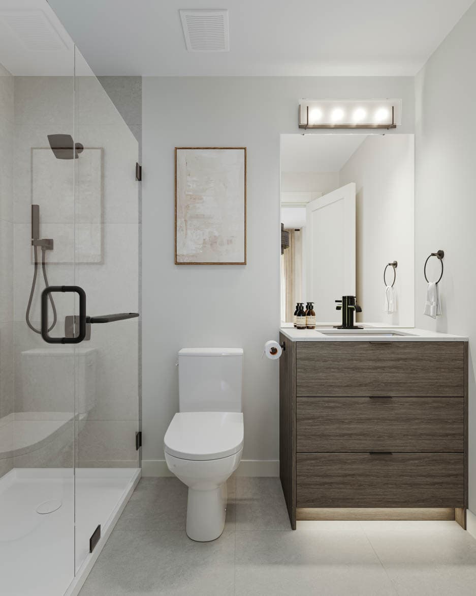 Kin & Kith – An ensuite bathroom with a glass-enclosed walk-in shower, floating dark wood vanity, matte black hardware, and large mirror.