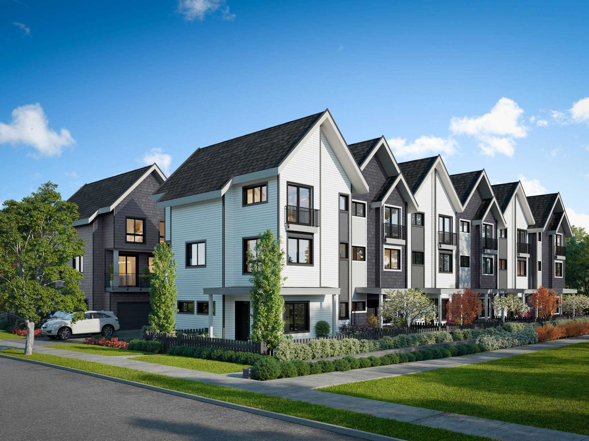 Kin & Kith – Daytime exterior rendering of a row of modern three-story townhomes with white and dark siding, pitched roofs, and manicured landscaping along the street.