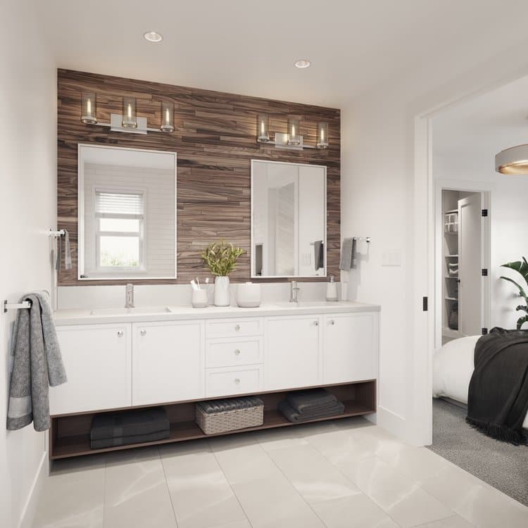 Jasper – Double-vanity bathroom with a textured dark wood feature wall, twin mirrors, vanity lighting, and white cabinets with open lower shelf storage, with a doorway leading into an adjacent bedroom.
