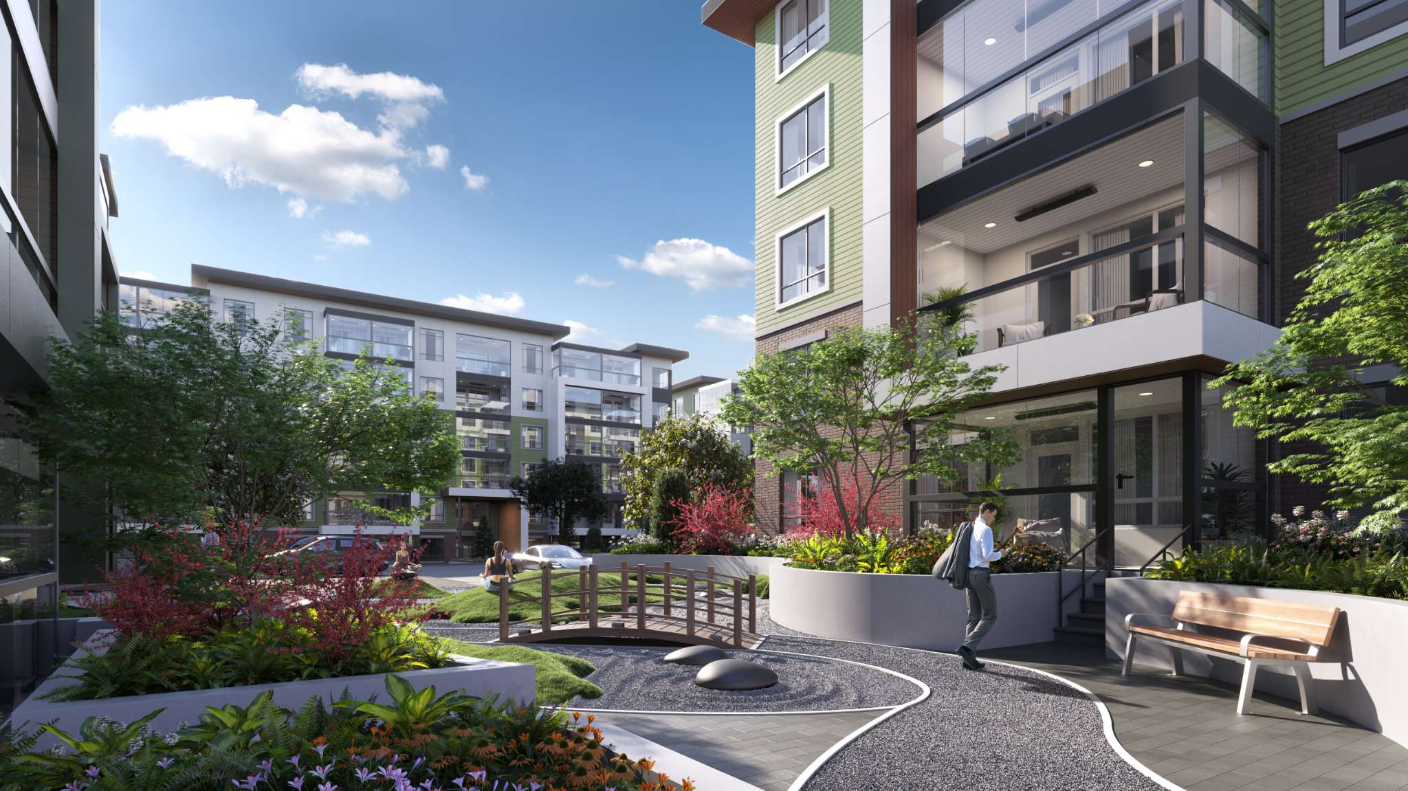 Sage 3 – Courtyard walkway between residential buildings with landscaped garden beds, a small footbridge over a rock garden, and a man walking toward the entrance.