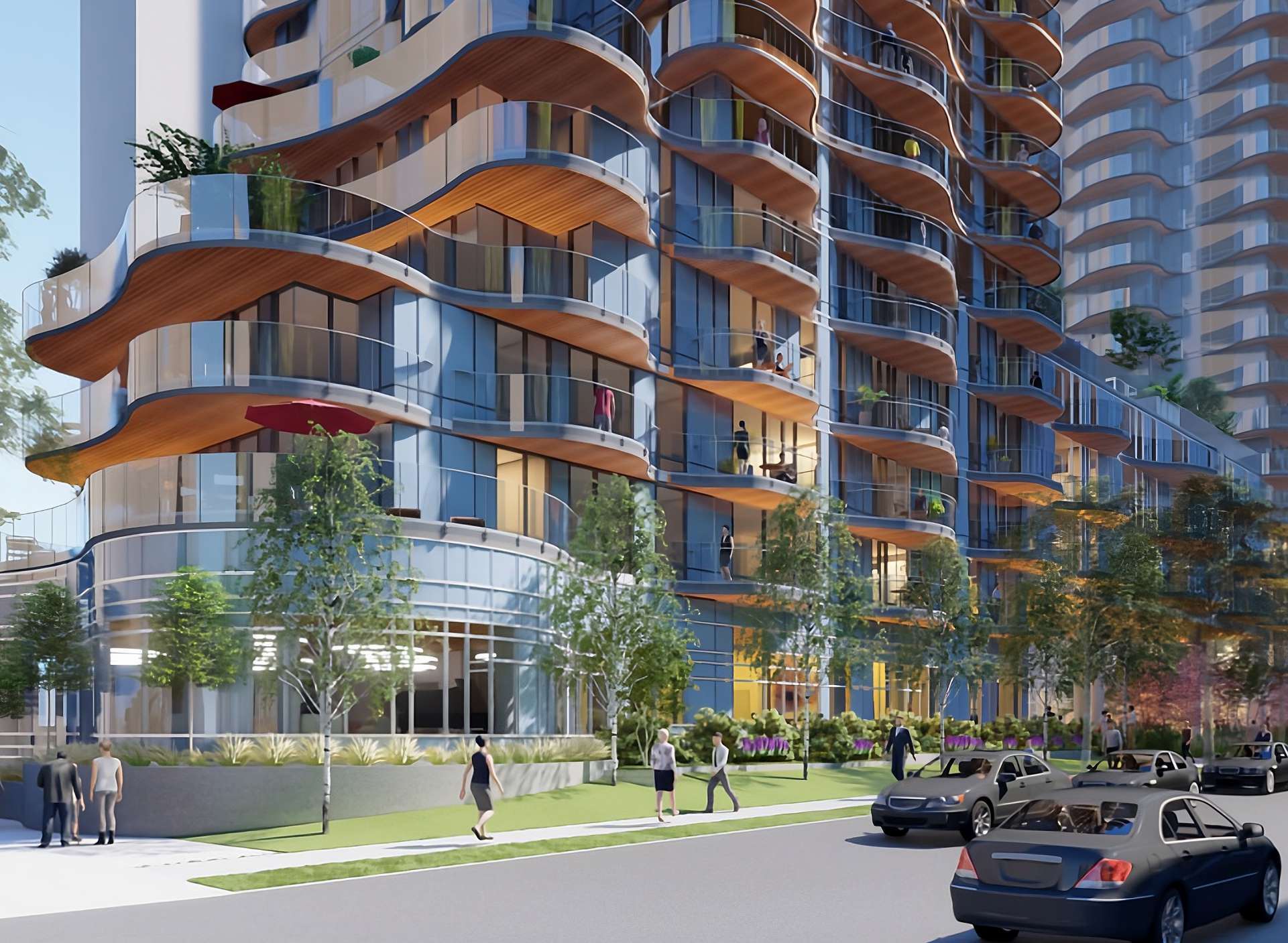 Alberni at Cardero Condos – A modern residential tower features dramatic, undulating balconies with warm wood-panel soffits and glass railings overlooking a tree-lined street. Pedestrians walk along the sidewalk past ground-floor retail glazing and lush landscaping, while cars drive by in the foreground under bright daylight.
