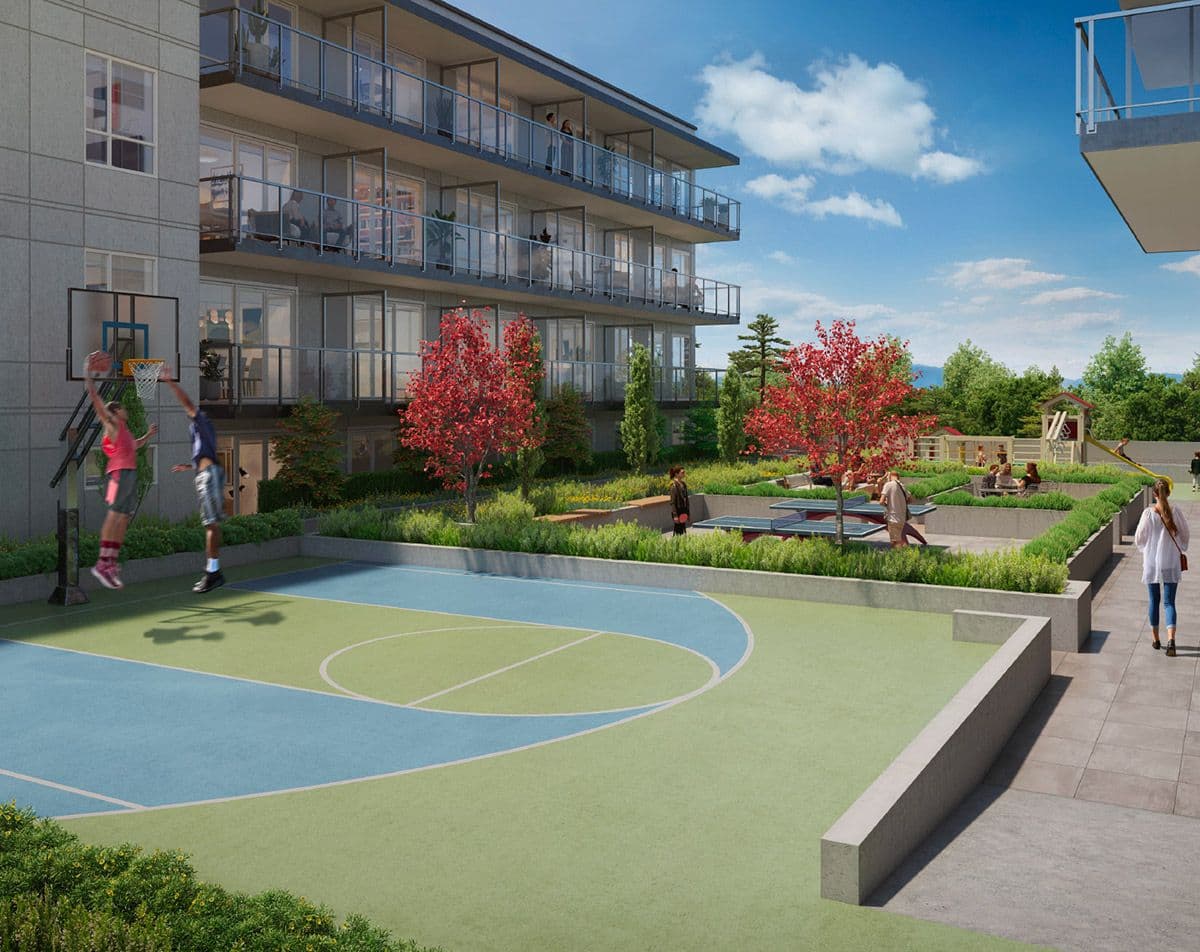 Walker House – An outdoor residential amenity courtyard featuring a blue and green basketball half-court, ping pong tables, and a children's play area next to a multi-story condominium building. Bright red autumn trees, manicured hedges, concrete retaining walls, and residents enjoying the sports facilities fill the sunny daylight scene.