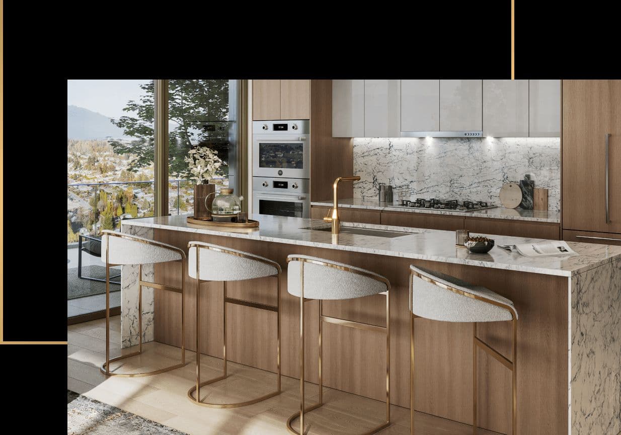 Étoile Gold Brentwood – Close-up of a kitchen island with wood cabinetry, marble countertop, gold fixtures, and upholstered bar stools with brass legs.