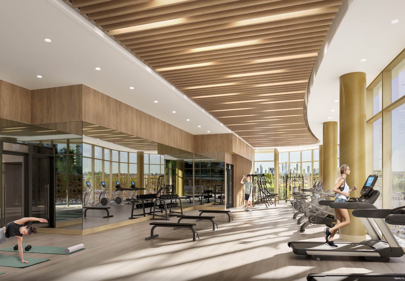 Étoile Gold Brentwood – Fitness room with treadmills, spin bikes, free weights, and floor-to-ceiling windows overlooking the city.