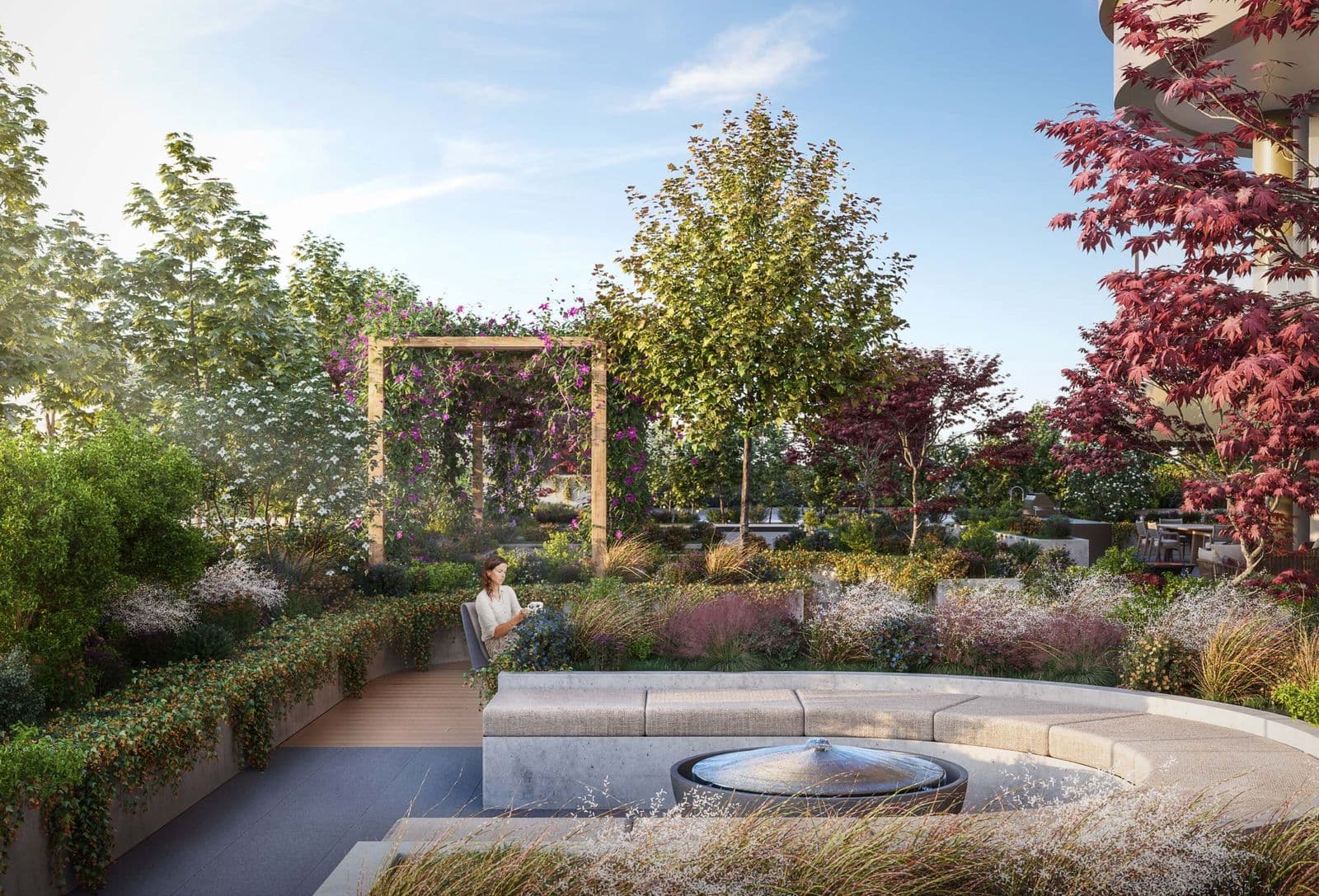 Étoile Gold Brentwood – Rooftop garden lounge with a wooden pergola, flowering vines, seating, and a small water feature.