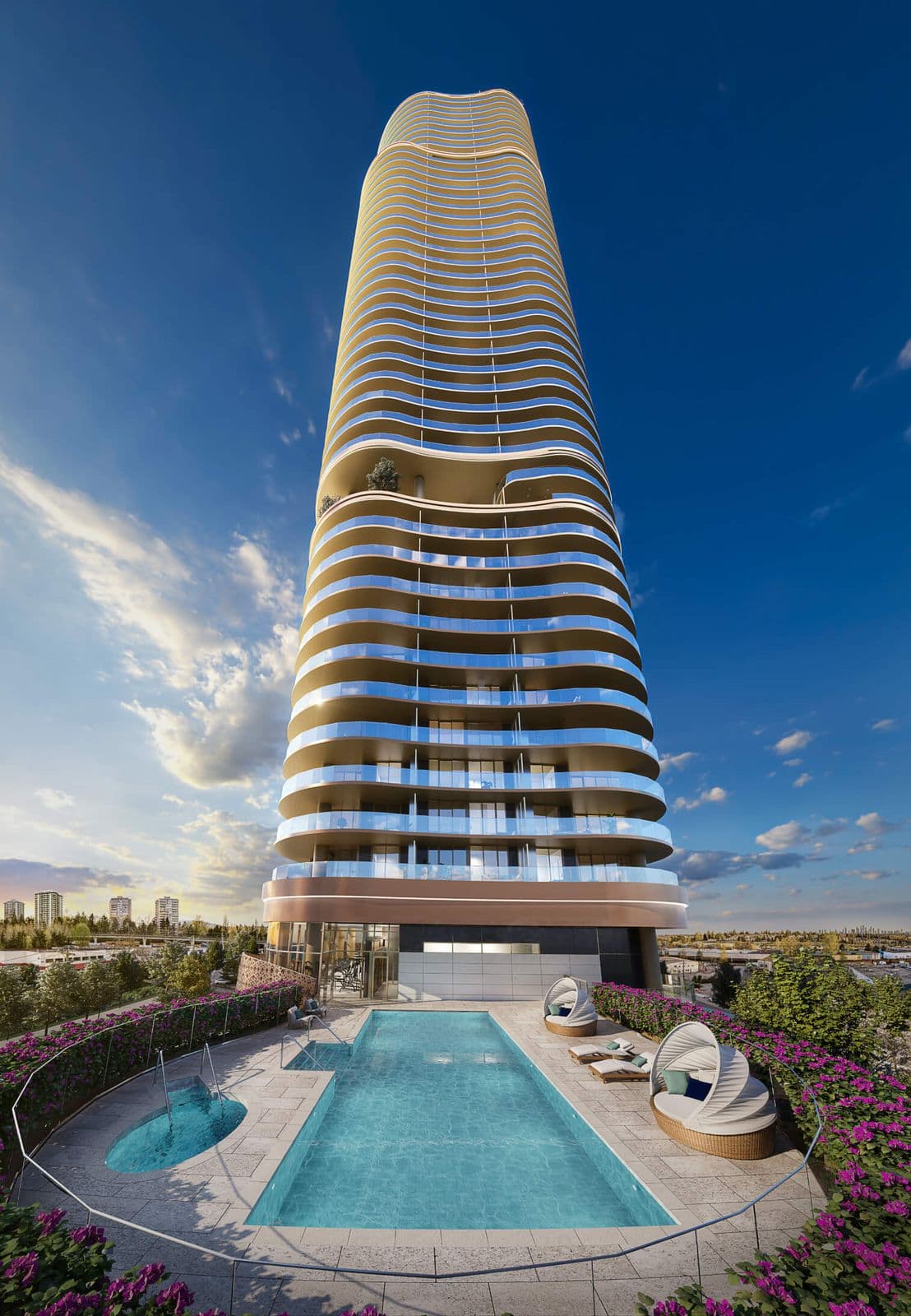Étoile Gold Brentwood – Rooftop pool deck with a lap pool and adjoining hot tub, lounge daybeds, and the curved tower rising behind at dusk.