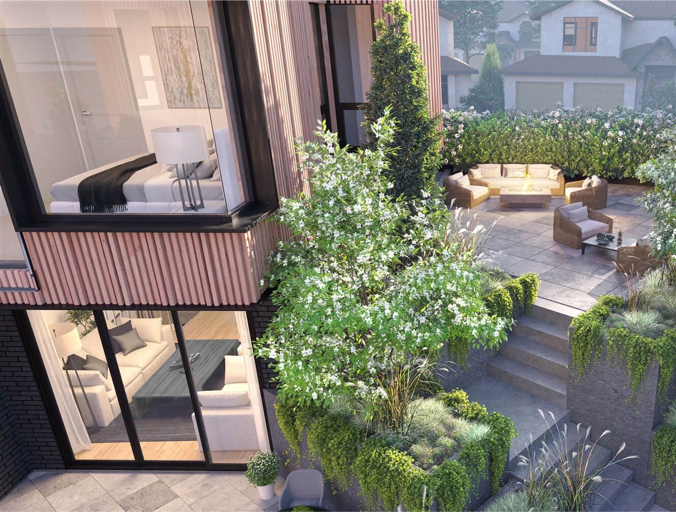 EIGHT – An elevated view down onto a rooftop patio with a lit fire table and lounge seating, next to a bedroom balcony, with neighboring houses beyond.